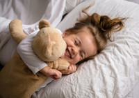 Ребенок скрипит зубами во сне: причины и лечение