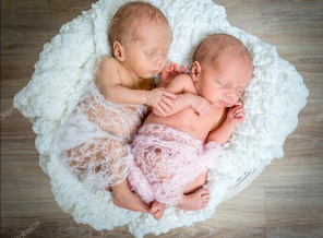 depositphotos_85543668-stock-photo-newborn-twins-sleeping-in-a_1615381240268