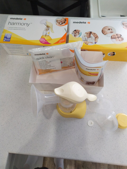 Молокоотсос Medela harmony как